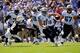 NASHVILLE, TN - SEPTEMBER 22: Quarterback Jake Locker #10 of the Tennessee Titans scrambles against the San Diego Chargers at LP Field on September 22, 2013 in Nashville, Tennessee. (Photo by Frederick Breedon/Getty Images)