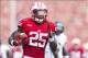 Aug 31, 2013; Madison, WI, USA; Wisconsin Badgers running back Melvin Gordon (25) rushes for a touchdown during the second quarter against the Massachusetts Minutemen at Camp Randall Stadium. Mandatory Credit: Jeff Hanisch-USA TODAY Sports