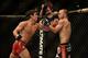 Apr 20, 2013; San Jose, CA, USA; Joseph Benavidez (left) fights Darren Uyenoyama (right) during the flyweight bout prelims of the UFC on Fuel TV at HP Pavilion. Mandatory Credit: Kyle Terada-USA TODAY Sports