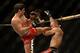 Apr 20, 2013; San Jose, CA, USA; Joseph Benavidez (left) fights Darren Uyenoyama (right) during the flyweight bout prelims of the UFC on Fuel TV at HP Pavilion. Mandatory Credit: Kyle Terada-USA TODAY Sports