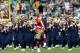 SOUTH BEND, IN - SEPTEMBER 21: Members of the Notre Dame Fighting Irish band perform a pre-game show before the start of a game against the Michigan State Spartans at Notre Dame Stadium on September 21, 2013 in South Bend, Indiana.(Photo by Jonathan Danie