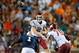 AUBURN, AL - AUGUST 31: Quarterback Connor Halliday #12 of the Washington State Cougars throws a pass over defensive tackle Montravius Adams #1 of the Auburn Tigers during the first half of play on August 31, 2013 at Jordan-Hare Stadium in Auburn, Alabam
