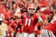Sep 21, 2013; Athens, GA, USA; Georgia Bulldogs quarterback Aaron Murray (11) throws a pass against the North Texas Mean Green during the second quarter at Sanford Stadium. Mandatory Credit: Dale Zanine-USA TODAY Sports