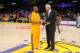 LOS ANGELES, CA - MARCH 22: Kobe Bryant #24 of the Los Angeles Lakers is presented with the Kia Western Conference player of the month award for February 2013 by general manager Mitch Kupchak before their team's game against the Washington Wizards at Stap