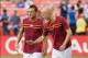 Aug 10, 2013; Washington, DC, USA; AS Roma forward Francesco Totti (10) and AS Roma midfielder Michael Bradley (4) talk before the game at RFK Stadium. Mandatory Credit: Paul Frederiksen-USA TODAY Sports
