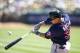 OAKLAND, CA - SEPTEMBER 22: Oswaldo Arcia #31 of the Minnesota Twins hits an RBI single against the Oakland Athletics during the first inning at O.co Coliseum on September 22, 2013 in Oakland, California. (Photo by Jason O. Watson/Getty Images)