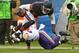 CHICAGO, IL - SEPTEMBER 15: Martellus Bennett #83 of the Chicago Bears is hit by Harrison Smith #22 of the Minnesota Vikings at Soldier Field on September 15, 2013 in Chicago, Illinois. The Bears defeated the Vikings 31-30. (Photo by Jonathan Daniel/Gett