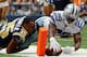 ARLINGTON, TX - SEPTEMBER 22: DeMarco Murray #29 of the Dallas Cowboys scores a touchdown while tackled by T.J. McDonald #25 of the St. Louis Rams at AT&T Stadium on September 22, 2013 in Arlington, Texas. (Photo by Ronald Martinez/Getty Images)