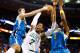 BOSTON, MA - JANUARY 16: Jared Sullinger #7 of the Boston Celtics fights for a rebound between Jason Smith #14 and Roger Mason Jr. #8 of the New Orleans Hornets during the game on January 16, 2013 at TD Garden in Boston, Massachusetts. NOTE TO USER: User