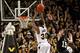 March 2, 2013; Richmond, VA USA; Virginia Commonwealth Rams guard Troy Daniels (30) shoots the ball as Butler Bulldogs guard Rotnei Clarke (15) defends in the first half at the Siegel Center. Mandatory Credit: Geoff Burke-USA TODAY Sports