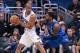 January 20, 2013; Orlando FL, USA; Orlando Magic shooting guard Arron Afflalo (4) drives to the basket as Dallas Mavericks shooting guard O.J. Mayo (32) defends during the first quarter at Amway Center. Mandatory Credit: Kim Klement-USA TODAY Sports