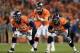 DENVER, CO - SEPTEMBER 23: Left guard Zane Beadles #68 of the Denver Broncos and left tackle Chris Clark #75 of the Denver Broncos prepare to defend the blind side of quarterback Peyton Manning #18 of the Denver Broncos as they face the Oakland Raiders a