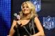 FORT LAUDERDALE, FL - FEBRUARY 04: Singer Carrie Underwood speaks to members of the media during the Pregame Show and National Anthem Press Conference held at the Fort Lauderdale Convention Center as part of media week for Super Bowl XLIV on February 4,