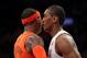 LOS ANGELES, CA - DECEMBER 25: Carmelo Anthony #7 of the New York Knicks and Metta World Peace #15 of the Los Angeles Lakers faceoff after the whistle during the NBA game at Staples Center on December 25, 2012 in Los Angeles, California. The Lakers defea