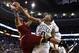 Apr 5, 2013; Boston, MA, USA; Cleveland Cavaliers power forward Tristan Thompson (left) shoots the ball against Boston Celtics point guard Avery Bradley (0) and power forward Brandon Bass (back) during the first half at TD Garden. Mandatory Credit: Mark