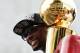 MIAMI, FL - JUNE 24: Forward Chris Bosh #1 of the Miami Heat holds the Larry O'Brien NBA Championship Trophy as he rides a bus during the Championship victory parade on the streets on June 24, 2013 in Miami, Florida. The Miami Heat defeated the San Anton