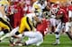 Dec. 30, 2011; Tempe, AZ, USA; Iowa Hawkeyes running back Jordan Canzeri (33) is tackled by Oklahoma Sooners linebacker Corey Nelson (7) and defensive back Demontre Hurst (6) during the second half during the 2011 Insight Bowl at Sun Devil Stadium. Man