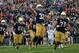 SOUTH BEND, IN - SEPTEMBER 21: Cam McDaniel #33 of the Notre Dame Fighting Irish celebrates his game-winning touchdown against the Michigan State Spartans at Notre Dame Stadium on September 21, 2013 in South Bend, Indiana. Notre Dame defeated Michigan St