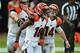 Sep 30, 2012; Jacksonville, FL, USA; Cincinnati Bengals wide receiver A.J. Green (18) gets a pat on the helmet from quarterback Andy Dalton (14) and guard Kevin Zeitler (68) after catching a pass for a touchdown during the fourth quarter against the Jacks