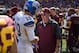 Sep 21, 2013; Minneapolis, MN, USA; San Jose State Spartans quarterback David Fales (10) and Minnesota Golden Gophers head coach Jerry Kill talk after the game at TCF Bank Stadium. The Gophers won 43-24. Mandatory Credit: Jesse Johnson-USA TODAY Sports