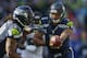 SEATTLE, WA - SEPTEMBER 22: Quarterback Russell Wilson #3 of the Seattle Seahawks hands off to running back Marshawn Lynch #24 against the Jacksonville Jaguars at CenturyLink Field on September 22, 2013 in Seattle, Washington. (Photo by Otto Greule Jr/G