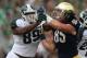 SOUTH BEND, IN - SEPTEMBER 21: Shilique Calhoun #89 of the Michigan State Spartans rushes against Troy Niklas #85 of the Notre Dame Fighting Irish at Notre Dame Stadium on September 21, 2013 in South Bend, Indiana. Notre Dame defeated Michigan State 17-1