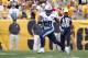 PITTSBURGH, PA - SEPTEMBER 08: Chris Johnson #28 of the Tennessee Titans rushes against the Pittsburgh Steelers during the game on September 8, 2013 at Heinz Field in Pittsburgh, Pennsylvania. (Photo by Justin K. Aller/Getty Images)
