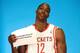 HOUSTON, TX - SEPTEMBER 27: Dwight Howard #12 of the Houston Rockets poses for a team photographer during Houston Rockets Media Day at the Toyota Center on September 27, 2013 in Houston, Texas. (Photo by Scott Halleran/Getty Images)