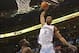 Nov 26, 2012; Oklahoma City, OK, USA; Oklahoma City Thunder forward Perry Jones (3) dunks the ball against Charlotte Bobcats center DeSagana Diop (2) during the second half at Chesapeake Energy Arena. Mandatory Credit: Mark D. Smith-USA TODAY Sports