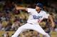 LOS ANGELES, CA - SEPTEMBER 27: Clayton Kershaw #22 of the Los Angeles Dodgers pitches against the Colorado Rockies during the first inning at Dodger Stadium on September 27, 2013 in Los Angeles, California. (Photo by Harry How/Getty Images)