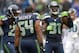 Sep 22, 2013; Seattle, WA, USA; Seattle Seahawks safety Kam Chancellor (31) celebrates with cornerback Richard Sherman (25) and linebacker Bobby Wagner (54) after intercepting a pass in the fourth quarter against the Jacksonville Jaguars at CenturyLink Fi