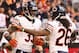 GLENDALE, AZ - DECEMBER 23: Cornerback Charles Tillman #33 of the Chicago Bears celebrates with cornerback Tim Jennings #26 after scoring a 10 yard interception touchdown against the Arizona Cardinals during the thrid quarter of the NFL game at the Unive