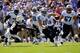 NASHVILLE, TN - SEPTEMBER 22: Quarterback Jake Locker #10 of the Tennessee Titans scrambles against the San Diego Chargers at LP Field on September 22, 2013 in Nashville, Tennessee. (Photo by Frederick Breedon/Getty Images)