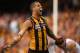 MELBOURNE, AUSTRALIA - SEPTEMBER 28: Lance Franklin of the Hawks celebrates winning the 2013 AFL Grand Final match between the Hawthorn Hawks and the Fremantle Dockers at Melbourne Cricket Ground on September 28, 2013 in Melbourne, Australia. (Photo by