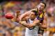 MELBOURNE, AUSTRALIA - SEPTEMBER 28: Brian Lake of the Hawks spoils a mark by Matthew Pavlich of the Dockers during the 2013 AFL Grand Final match between the Hawthorn Hawks and the Fremantle Dockers at Melbourne Cricket Ground on September 28, 2013 in M