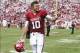 Sep 14, 2013; Norman, OK, USA; Oklahoma Sooners quarterback Blake Bell (10) reacts after the victory against the Tulsa Golden Hurricane at Gaylord Family - Oklahoma Memorial Stadium. Mandatory Credit: Kevin Jairaj-USA TODAY Sports