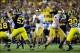 Sep 7, 2013; Ann Arbor, MI, USA; Notre Dame Fighting Irish quarterback Tommy Rees (11) looks to pass during the second quarter against the Michigan Wolverines at Michigan Stadium. Mandatory Credit: Andrew Weber-USA TODAY Sports