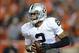 Sep 23, 2013; Denver, CO, USA; Oakland Raiders quarterback Terrelle Pryor (2) throws a pass against the Denver Broncos at Sports Authority Field at Mile High. The Broncos defeated the Raiders 37-21. Mandatory Credit: Kirby Lee-USA TODAY Sports