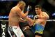 Feb 23, 2013; Anaheim, CA, USA; Dan Henderson (blue gloves) fights Lyoto Machida (red gloves) during their UFC welterweight bout at the Honda Center. Mandatory Credit: Jayne Kamin-Oncea-USA TODAY Sports