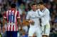 MADRID, SPAIN - SEPTEMBER 28: Gareth Bale (L) of Real Madrid CF talks with his team-mate Cristiano Ronaldo during the La Liga match between Real Madrid CF and Club Atletico de Madrid at Estadio Santiago Bernabeu on September 28, 2013 in Madrid, Spain. (P
