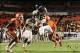 Jan 4, 2012; Miami Gardens, FL, USA; West Virginia Mountaineers wide receiver Willie Milhouse (85) dives for a touchdown during the fourth quarter of the 2012 Orange Bowl game against the Clemson Tigers at Sun Life Stadium. Mountaineers won 70 to 33. Mand
