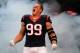 HOUSTON, TX - AUGUST 17: J.J. Watt #99 of the Houston Texans enters the field before the start of the preseason game against the Miami Dolphins at Reliant Stadium on August 17, 2013 in Houston, Texas. (Photo by Scott Halleran/Getty Images)