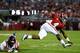 TUSCALOOSA, AL - SEPTEMBER 28: T.J. Yeldon #4 of the Alabama Crimson Tide leaps over Mike Hilton #28 of the Mississippi Rebels at Bryant-Denny Stadium on September 28, 2013 in Tuscaloosa, Alabama. (Photo by Kevin C. Cox/Getty Images)