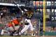 PITTSBURGH, PA - AUGUST 06: Andrew McCutchen #22 of the Pittsburgh Pirates hits a two RBI double in the third inning against the Miami Marlins during the game on August 6, 2013 at PNC Park in Pittsburgh, Pennsylvania. (Photo by Justin K. Aller/Getty Ima