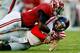 TUSCALOOSA, AL - SEPTEMBER 28: C.J. Mosley #32 of the Alabama Crimson Tide tackles Bo Wallace #14 of the Mississippi Rebels at Bryant-Denny Stadium on September 28, 2013 in Tuscaloosa, Alabama. (Photo by Kevin C. Cox/Getty Images)