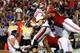 TUSCALOOSA, AL - SEPTEMBER 28: Bo Wallace #14 of the Mississippi Rebels is sacked in the end zone for a safety by Jeoffrey Pagan #8, Jarrick Williams #20, Brandon Ivory #99, and C.J. Mosley #32 of the Alabama Crimson Tide at Bryant-Denny Stadium on Septe