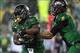 Sep 28, 2013; Eugene, OR, USA; Oregon Ducks quarterback Marcus Mariota (8) hands the ball off to Oregon Ducks running back Byron Marshall (9) at Autzen Stadium. Mandatory Credit: Scott Olmos-USA TODAY Sports