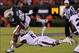 Sep 14, 2013; Auburn, AL, USA; Auburn Tigers running back Corey Grant (20) is brought down by Mississippi State Bulldogs defensive back Jamerson Love (5) at Jordan Hare Stadium. Mandatory Credit: Shanna Lockwood-USA TODAY Sports