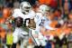 Sep 23, 2013; Denver, CO, USA; Oakland Raiders running back Darren McFadden (20) runs with the ball during the second half against the Denver Broncos at Sports Authority Field at Mile High. The Broncos won 37-21. Mandatory Credit: Chris Humphreys-USA TOD