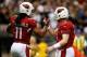 NEW ORLEANS, LA - SEPTEMBER 22: Carson Palmer and Larry Fitzgerald #11 of the Arizona Cardinals celebrate after a touchdown against the New Orleans Saints at the Mercedes-Benz Superdome on September 22, 2013 in New Orleans, Louisiana. (Photo by Chris